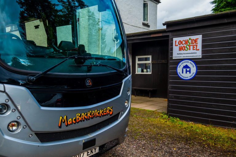 MacBackpackers Bus outside Lochside Hostel